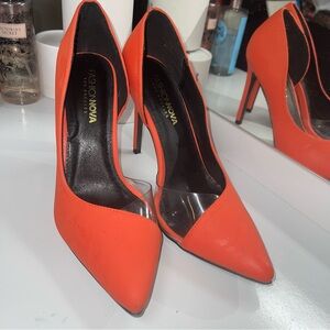 Orange stiletto pumps